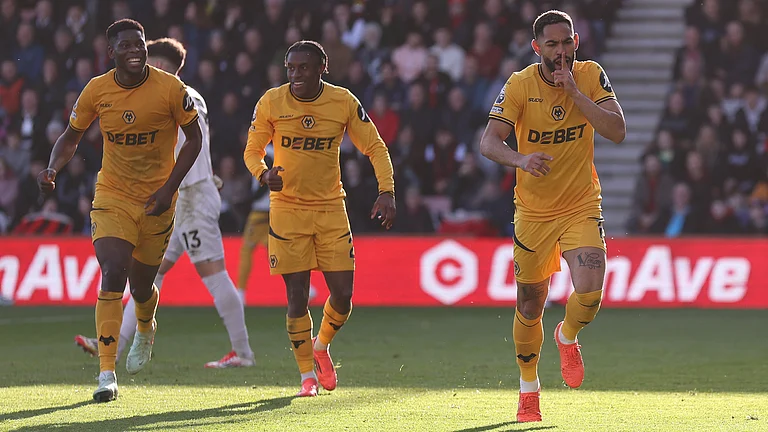 Wolves' players celebrate Matheus Cunha's goal against Bournemouth. - null