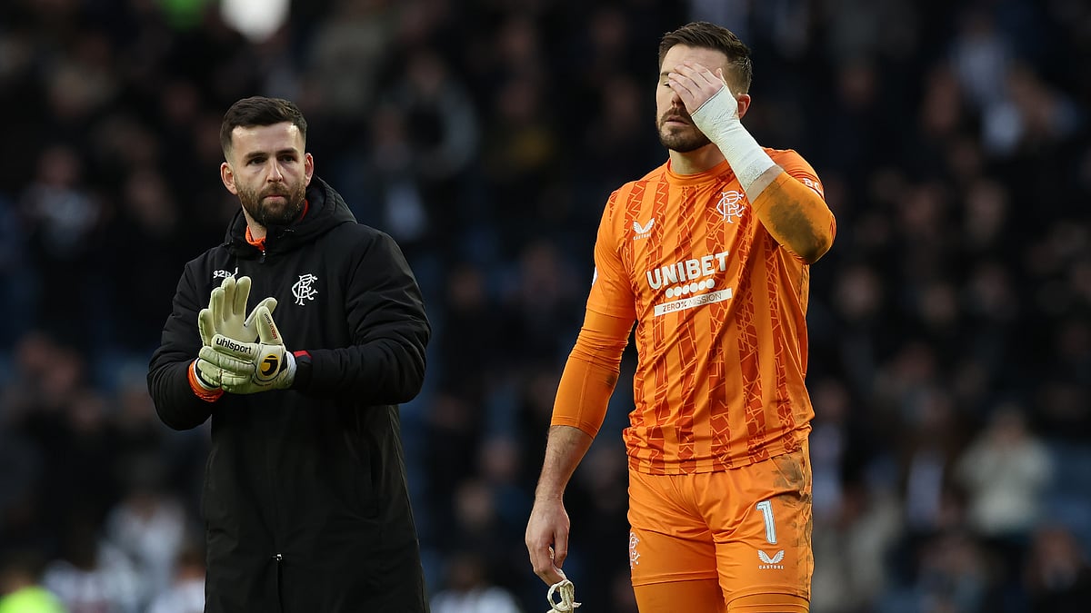 Jack Butland looks dejected after Rangers' defeat - null