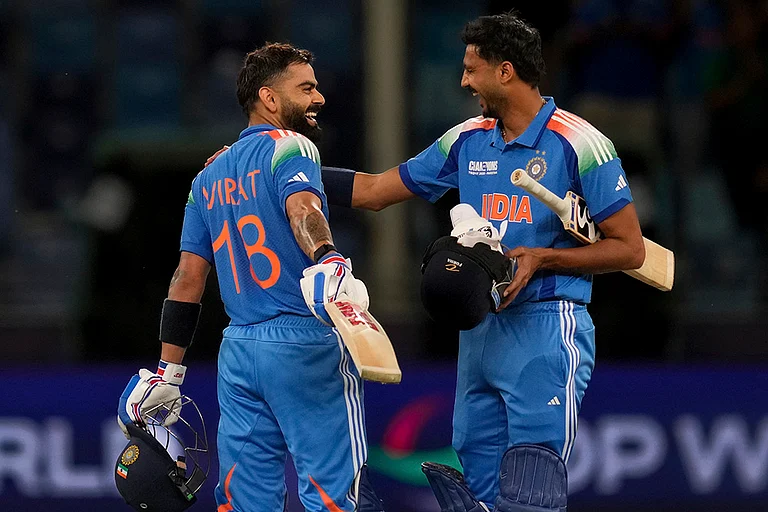 ICC Champions Trophy, IND vs PAK: India's Virat Kohli, left, and Axar Patel celebrate after winning the match - | Photo: AP/Altaf Qadri