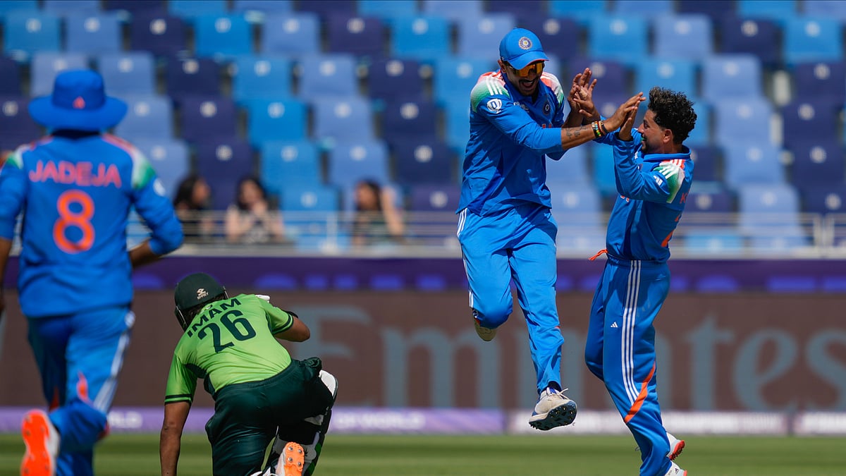Indias Axar Patel, second from right, celebrates with Kuldeep Yadav. AP