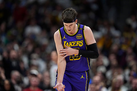 NBA 2024-25, Lakers vs Nuggets: Lakers guard Austin Reaves gestures after hitting a 3-point basket