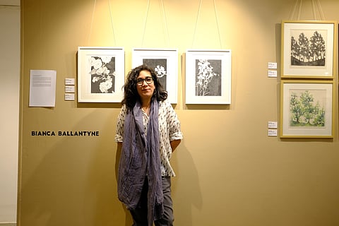 Artist Bianca Ballantyne with her exhibited work |