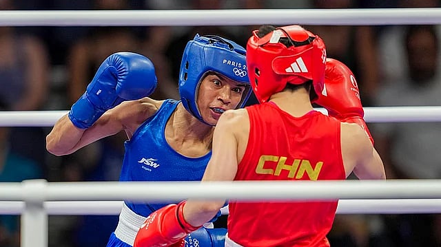 AP : File photo of India's Nikhat Zareen (in blue) competing at the Paris Olympics.