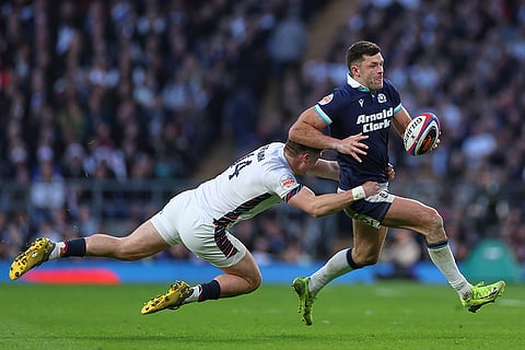 Calcutta Cup 2025: England's Tommy Freeman tackles Scotland's Blair Kinghorn 