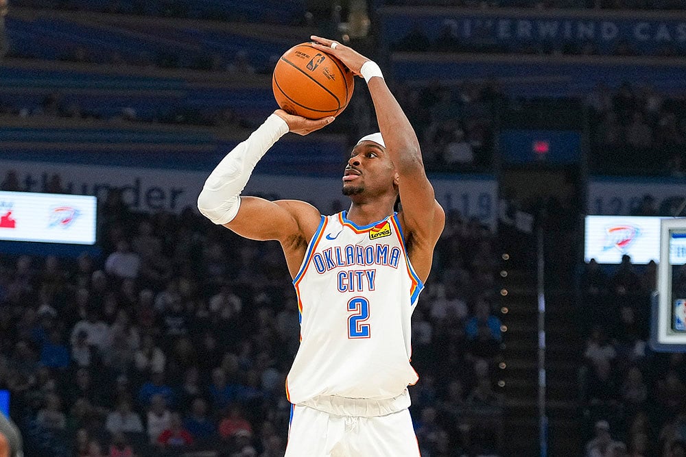 | Photo: AP/Kyle Phillips : NBA 2024-25, Timberwolves vs Thunder: Thunder guard Shai Gilgeous-Alexander shoots