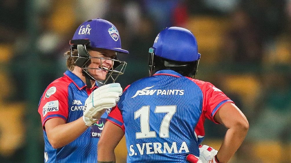 X | Delhi Capitals  : Jess Jonassen and Shafali Verma during the Delhi Capitals Vs Gujarat Giants, WPL 2025 match. 