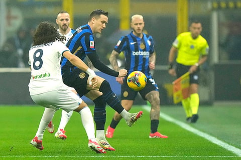 Coppa Italia, Inter vs Lazio: Inter Milan's Stefan de Vrij, right, challenges for the ball with Lazio's Loum Tchaouna