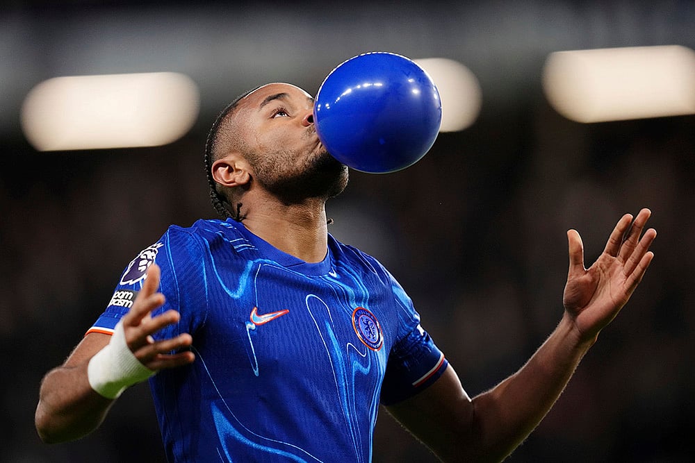 | Photo: John Walton/PA via AP : EPL 2024-25, Chelsea vs Southampton: Chelsea's Christopher Nkunku celebrates scoring 