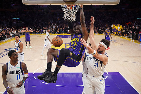 NBA 2024-25: Lakers forward LeBron James (23) dunks 