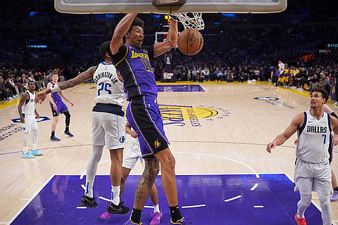 NBA 2024-25: Lakers center Jaxson Hayes (11) dunks 