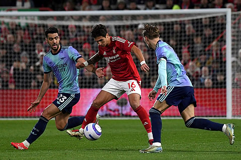 EPL 2024-25: Nottingham Forest's Nicolas Dominguez and Arsenal's Mikel Merino fight for the ball