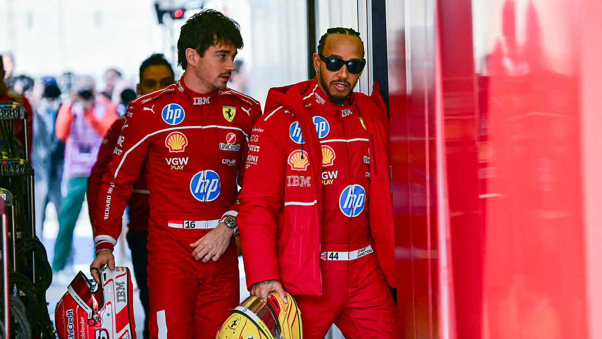 Lewis Hamilton pictured with Charles Leclerc at pre-season testing.