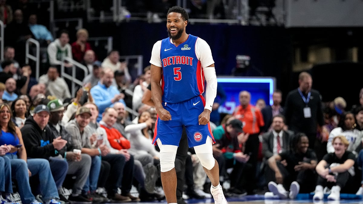 Malik Beasley #5 of the Detroit Pistons smiles during the fourth quarter against the Boston Celtics at Little Caesars Arena on February 26, 2025 in Detroit, Michigan.