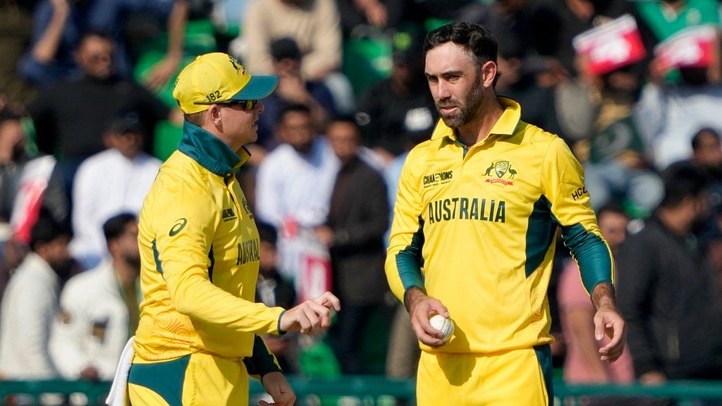 Glenn Maxwell with Steve Smith. - AP/K.M. Chaudary