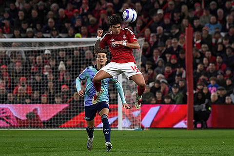 EPL 2024-25: Nottingham Forest's Nicolas Dominguez jumps for the ball 