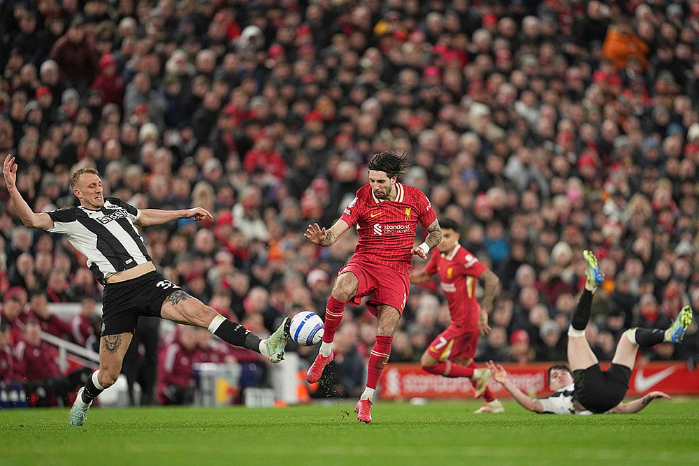 English Premier League Soccer 2024-25 Liverpool Vs Newcastle United match photo: Dan Burn