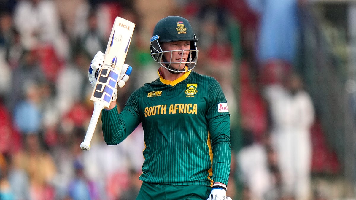 AP Photo/Anjum Naveed : South Africa's Rassie van der Dussen celebrates after scoring fifty during the ICC Champions Trophy cricket match between Afghanistan and South Africa, in Karachi.