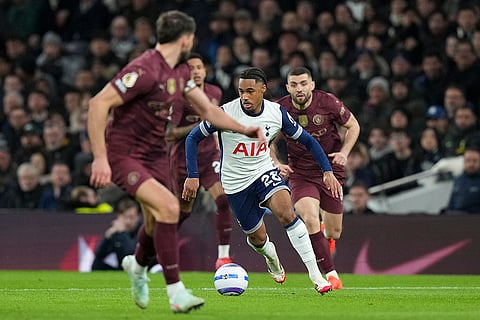 EPL 2024-25: Tottenham's Wilson Odobert controls the ball 