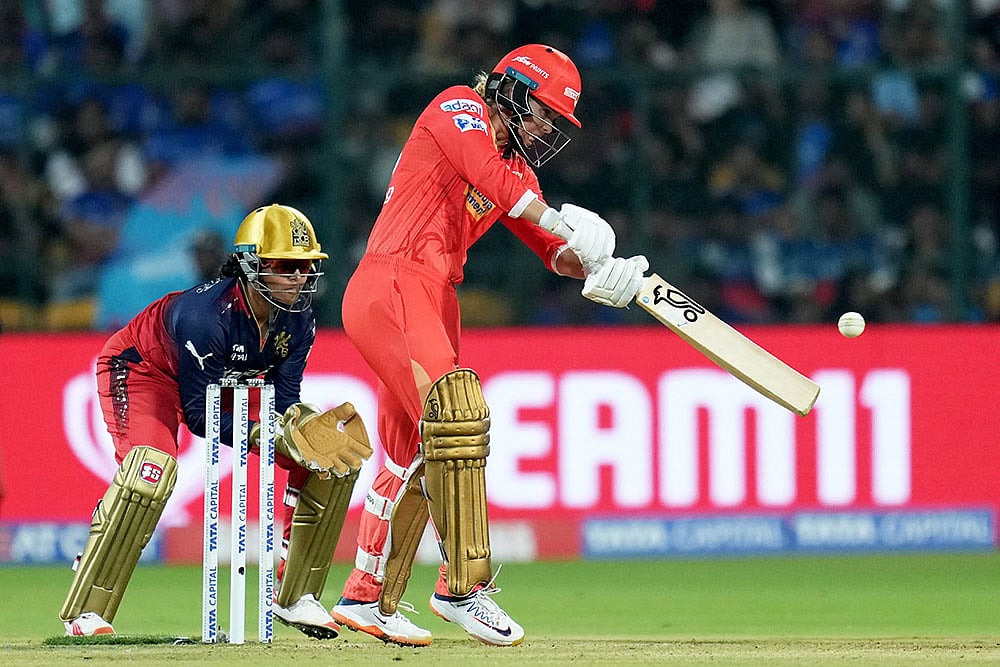 | Photo: AP/Shailendra Bhojak : WPL 2025, RCB vs GG: Gujarat Giants’ Phoebe Litchfield plays a shot