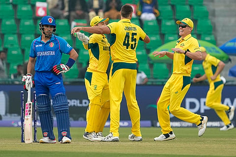 ICC Champions Trophy, AFG vs AUS: Australia's Spencer Johnson, center, celebrates a wicket