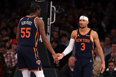 NBA 2024-25: Knicks' Ariel Hukporti, left, and Josh Hart high-five