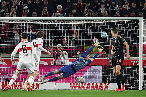 Bundesliga soccer 2024-25: Stuttgart's Angelo Stiller, left, scores a goal