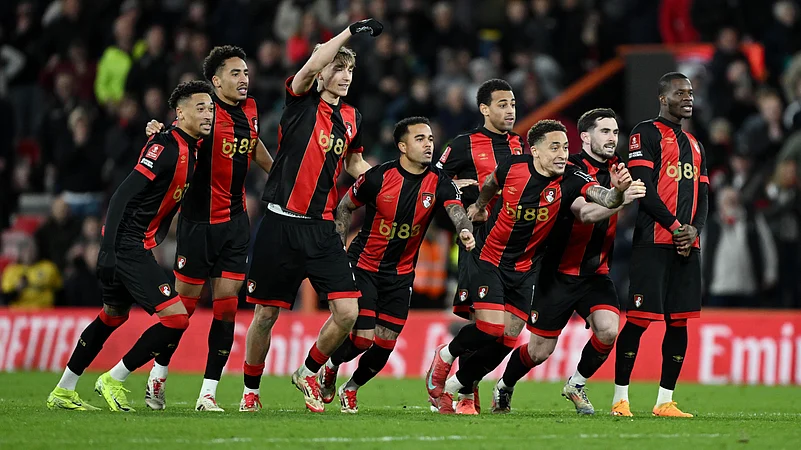 Bournemouths players celebrate their penalty shoot-out win