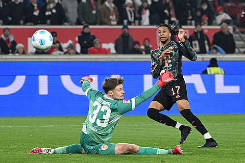 Bundesliga soccer 2024-25: Munich's Michael Olise, right, scores a goal