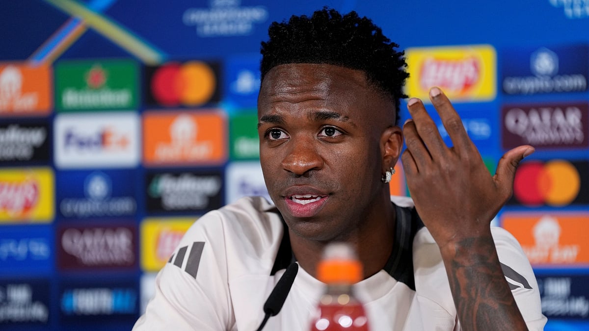 Vinicius Junior pictured at Monday's pre-match press conference - null