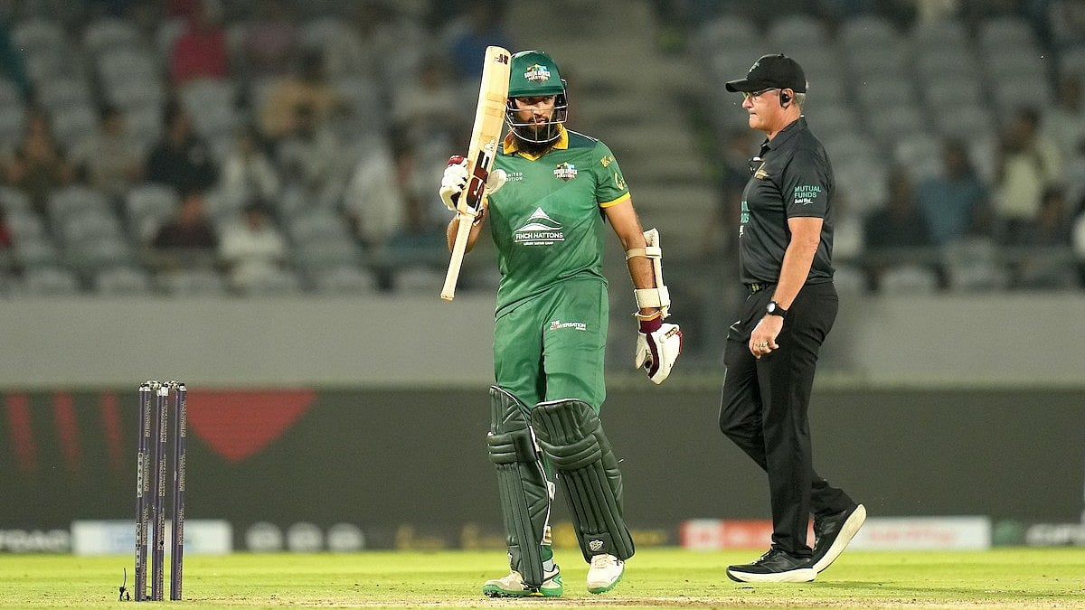 Special Arrangement : Hashim Amla celebrates his half century for South Africa Masters.
