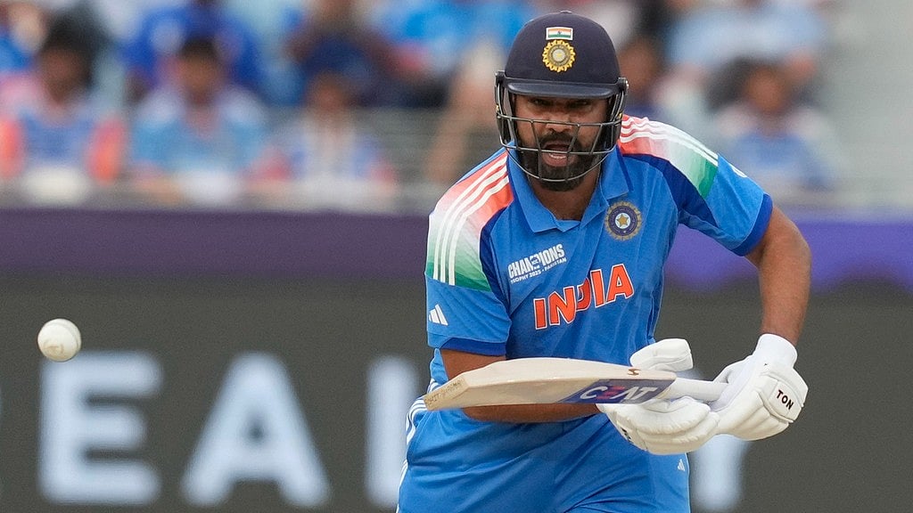 AP : India's captain Rohit Sharma plays a shot during the ICC Champions Trophy semi-final against Australia.