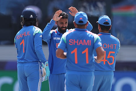 CT 2025 IND vs AUS semifinal: Varun Chakravarthy celebrates with teammates after the dismissal of Australia's Travis Head 