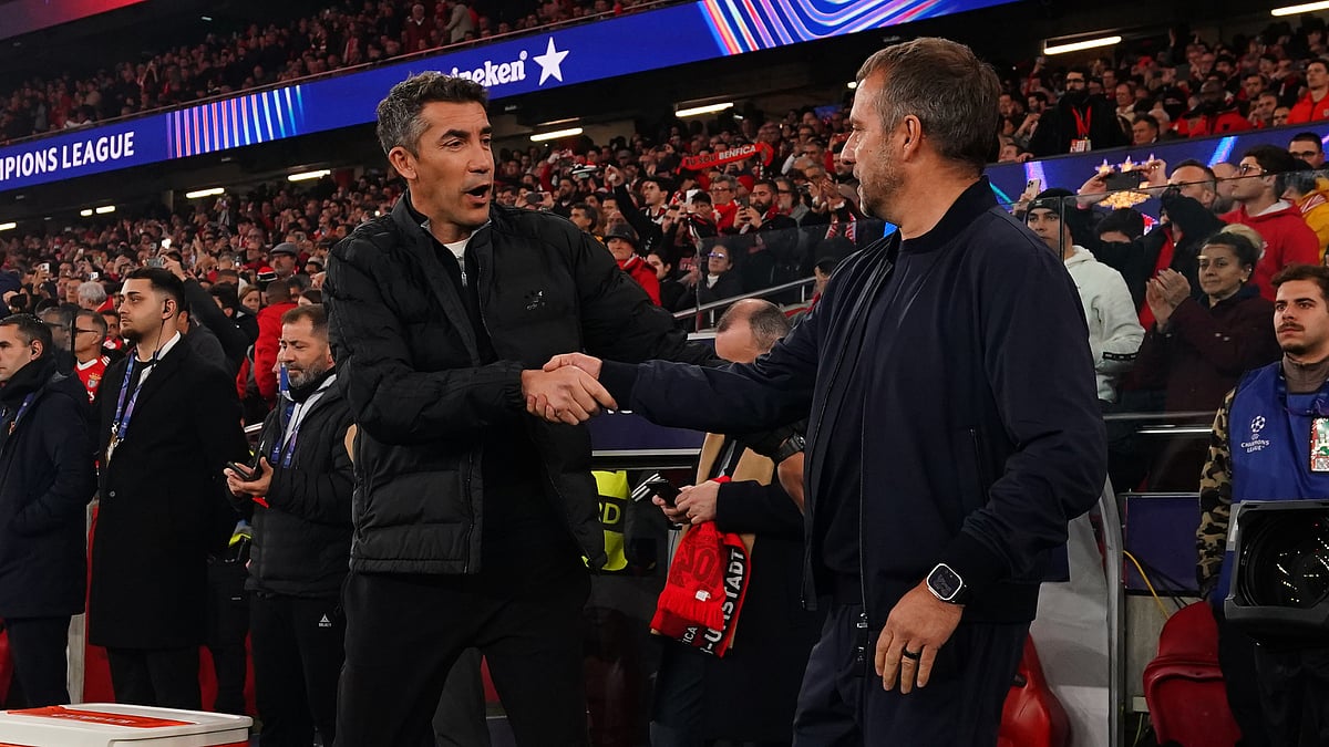 Bruno Lage and Hansi Flick share a handshake. - null