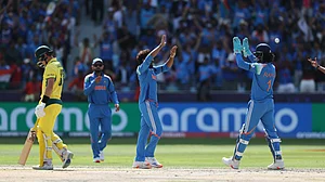AP Photo/Christopher Pike : India's Ravindra Jadeja, center, celebrates with teammates after the dismissal of Australia's Marnus Labuschagne, left, during the ICC Champions Trophy semifinal cricket match between India and Australia at Dubai International Cricket Stadium in Dubai.
