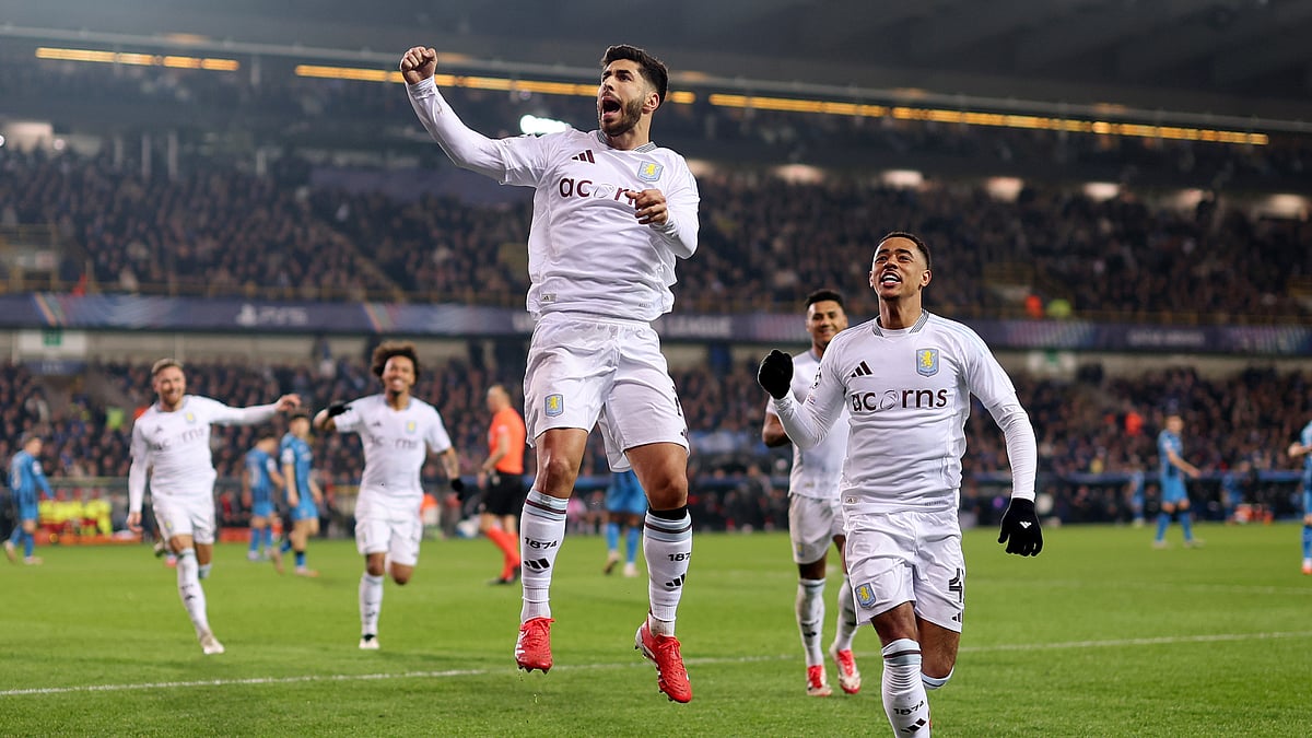 Marco Asensio celebrates his penalty against Club Brugge