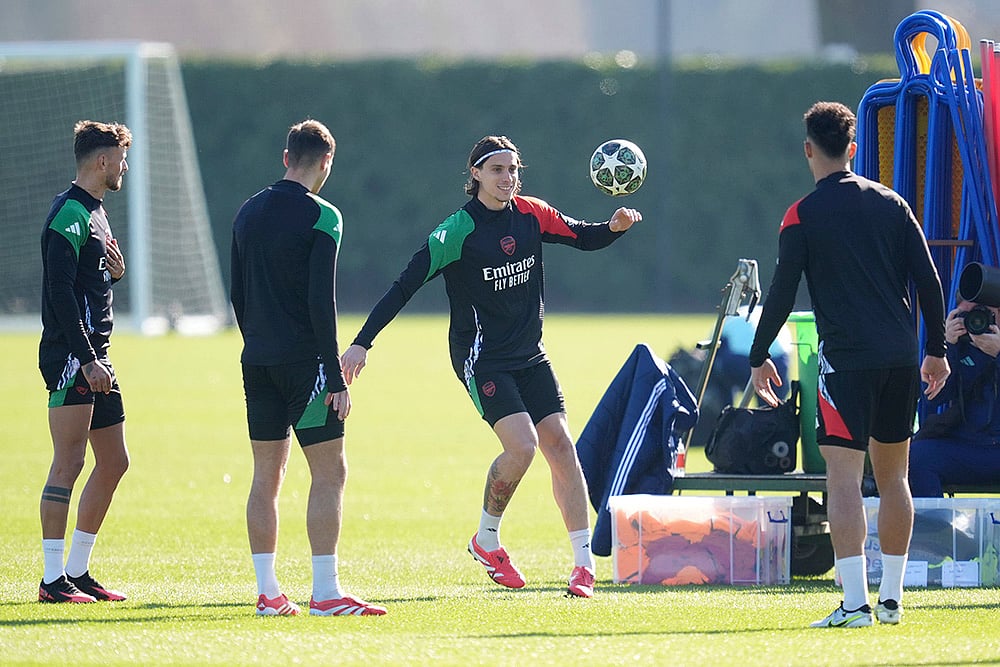 UEFA Champions League Round Of 16, Arsenal players during a training session_Riccardo Calafiori
