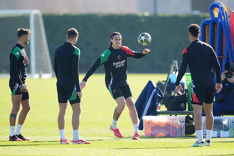 UEFA Champions League Round Of 16, Arsenal players during a training session_Riccardo Calafiori