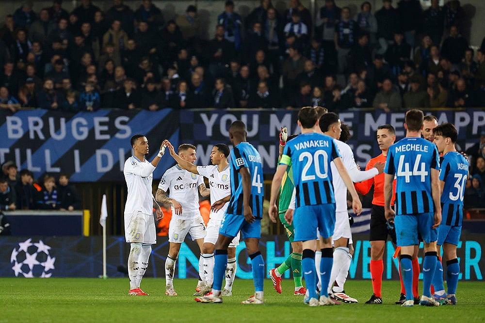 | Photo: AP/Geert Vanden Wijngaert : UCL 2024-25 Round Of 16 First leg, Brugge vs Villa: Aston Villa players, left, celebrate their win