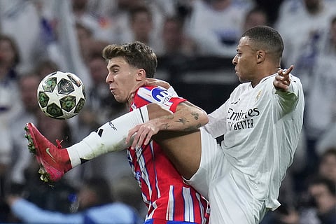 UCL 2024-25 Round Of 16 First leg, RMA vs ATM: Pablo Barrios, left, fights for the ball with Kylian Mbappe