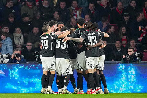 UCL 2024-25 Round Of 16 First leg, PSV vs ARS: Arsenal's players celebrate their side's fourth goal