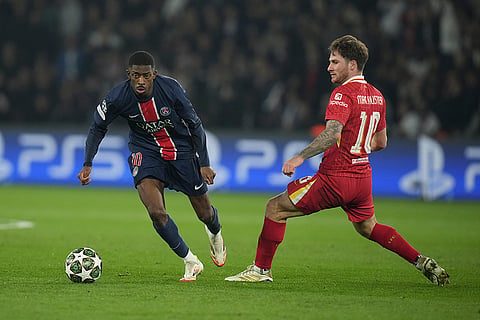 UCL round of 16 first leg, PSG vs LFC: PSG's Ousmane Dembele and Liverpool's Alexis Mac Allister fight for the ball