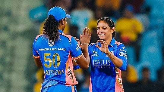 Mumbai Indians Hayeley Matthews with captain Harmanpreet Kaur.