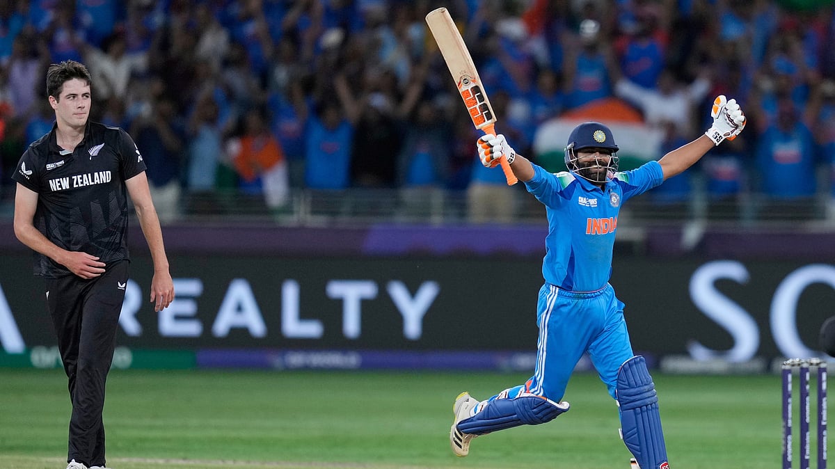 New Zealands Will ORourke, left, reacts as Indias Ravindra Jadeja. AP