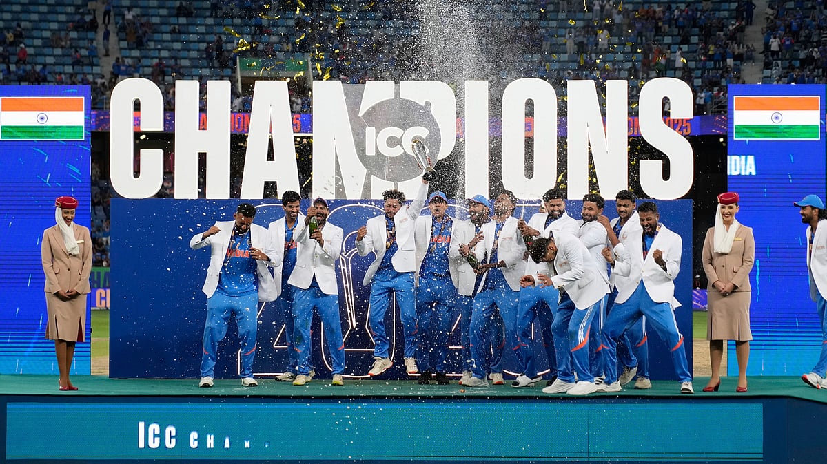 AP Photo/Altaf Qadri : India's players celebrate after winning the ICC Champions Trophy final cricket match against New Zealand at Dubai International Cricket Stadium in Dubai.