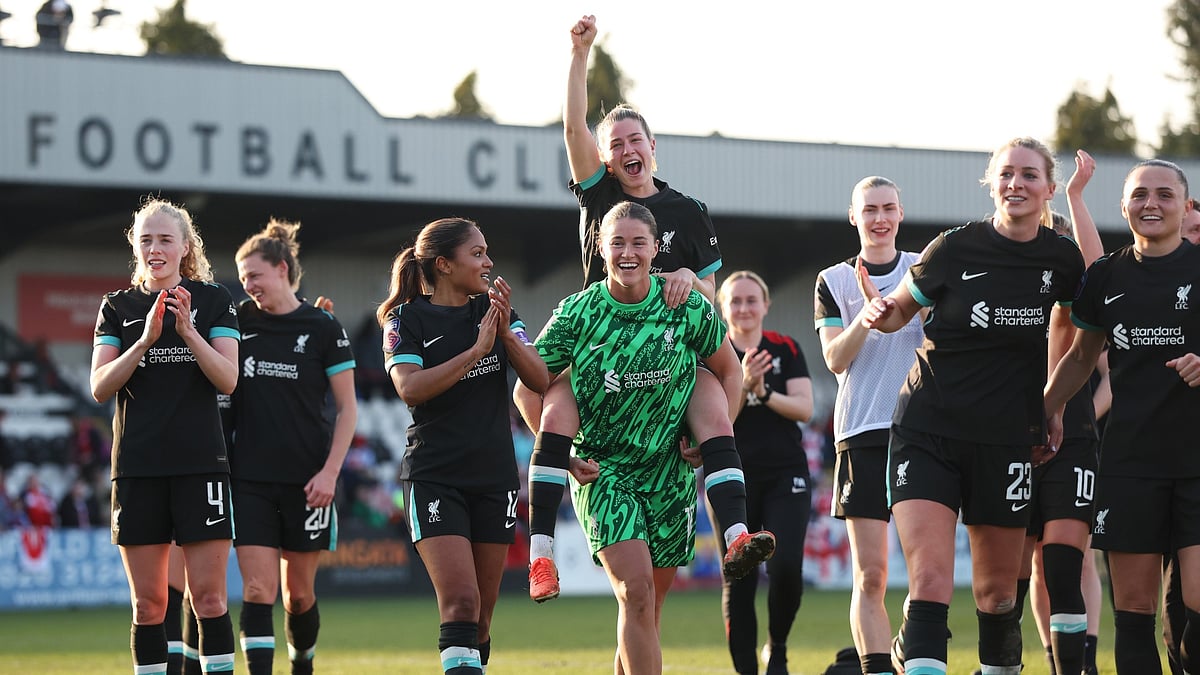 Liverpool celebrate beating Arsenal in Women's FA Cup quarterfinal match. 