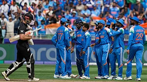 AP/Altaf Qadri : India's Kuldeep Yadav, center, celebrates with teammates after the dismissal of New Zealand's Kane Williamson, left, during the ICC Champions Trophy final cricket match between India and New Zealand at Dubai International Cricket Stadium in Dubai, United Arab Emirates, Sunday, March 9, 2025.