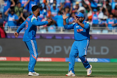 CT 2025, IND vs NZ final: India's Varun Chakravarthy celebrates after the dismissal of New Zealand's Glenn Phillips 