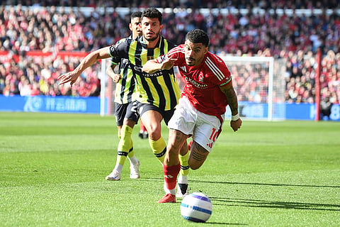 EPL 2024-25, Forest Vs Man City: Nottingham Forest's Morgan Gibbs-White, front, and Manchester City's Matheus Nunes go for the ball 