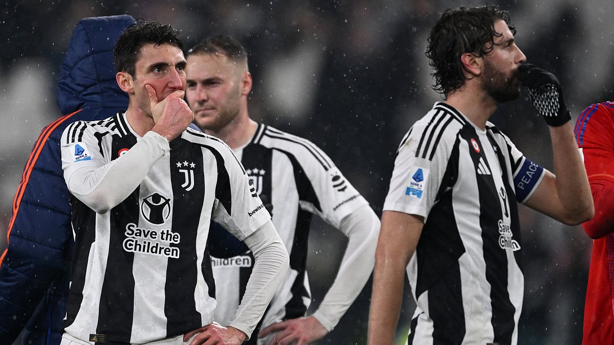 Juventus' players look on in disappointment after their loss to Atalanta