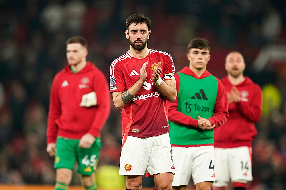 | Photo: AP/Dave Thompson : EPL: Manchester United vs Arsenal